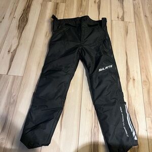Motorcycle pants- brand new, over pants, waterproof, size full zips, knew pads